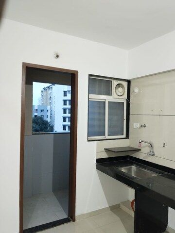 Kitchen in 2 BHK Apartment at Kanchan Royal Exotica, Kondhwa – for Rent