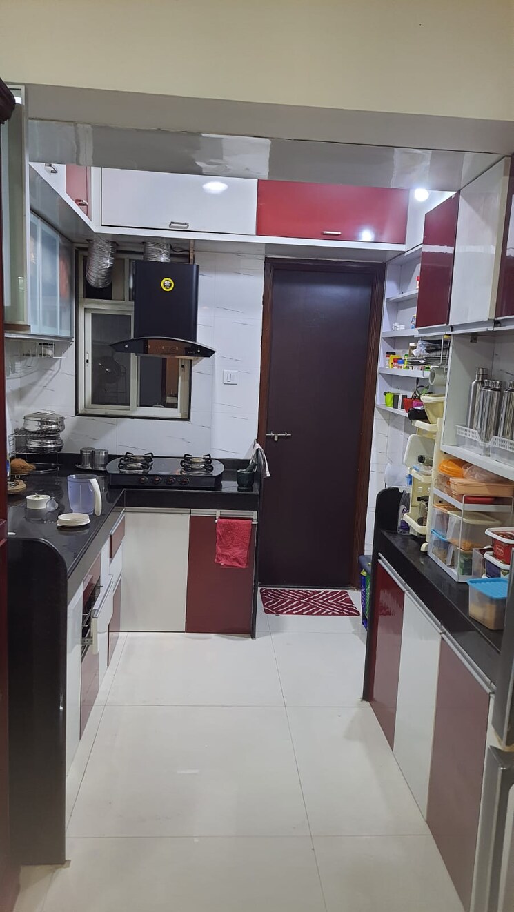 Kitchen, supertech-defence-colony-phase-ii 3 Bedroom 1200 Sq.Ft. Apartment In Wagholi Pune 8328818