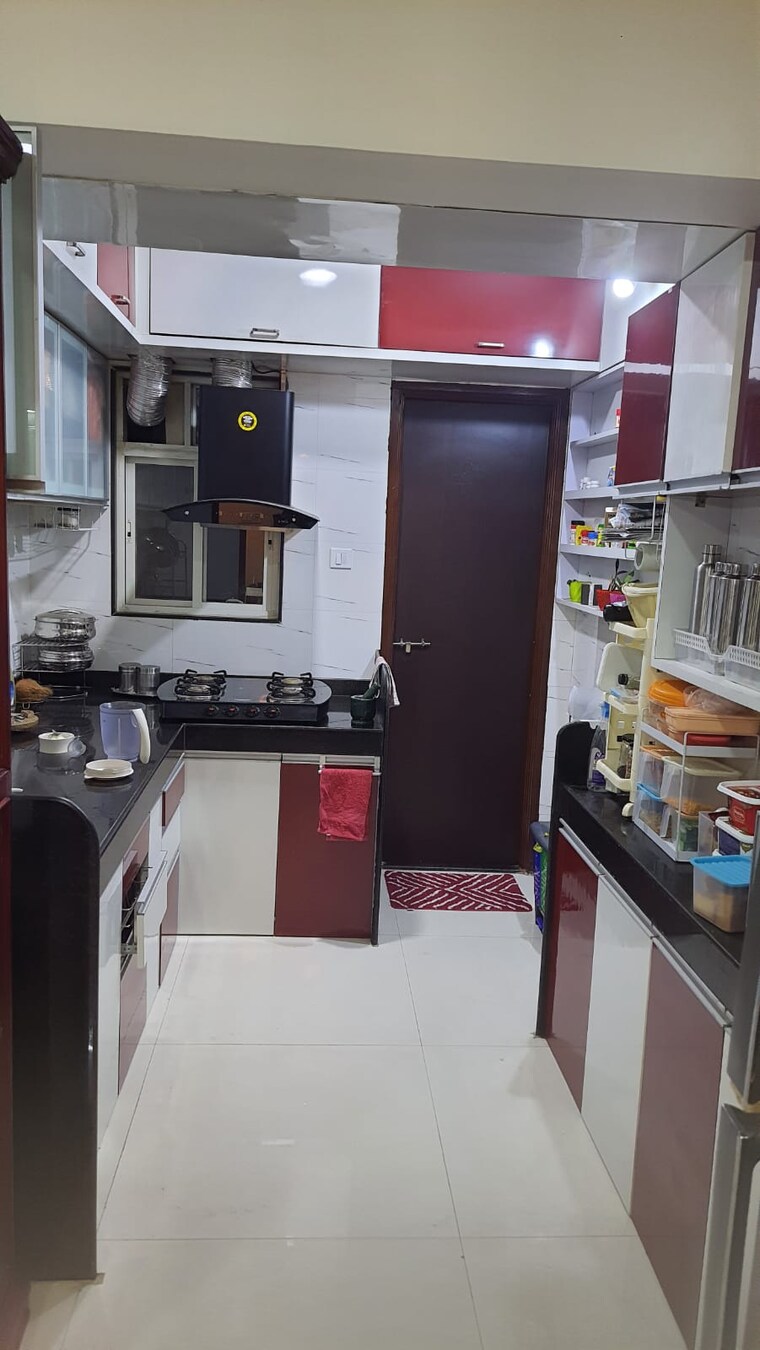 Kitchen, supertech-defence-colony-phase-ii 3 Bedroom 1200 Sq.Ft. Apartment In Wagholi Pune 8328818