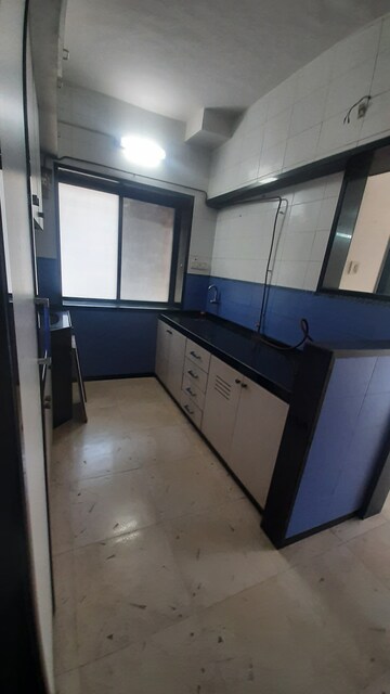 Kitchen in 1 RK Apartment at Gokuldham Complex, Goregaon East – for Rent