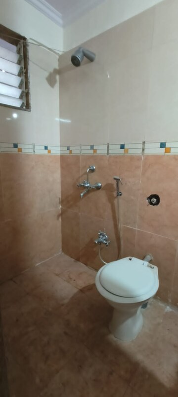 Bathroom in 2 BHK Apartment at Hill Palace CHS Ltd, Pokhran Road No 1 – for Rent