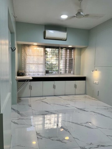 Kitchen in 2 BHK Apartment at Asha Nagar CHS, Mulund West – for Rent