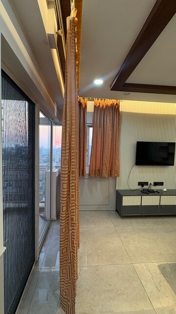 Living Room in 4 BHK Apartment at Chandra Panorama, Sushant Golf City – for Rent