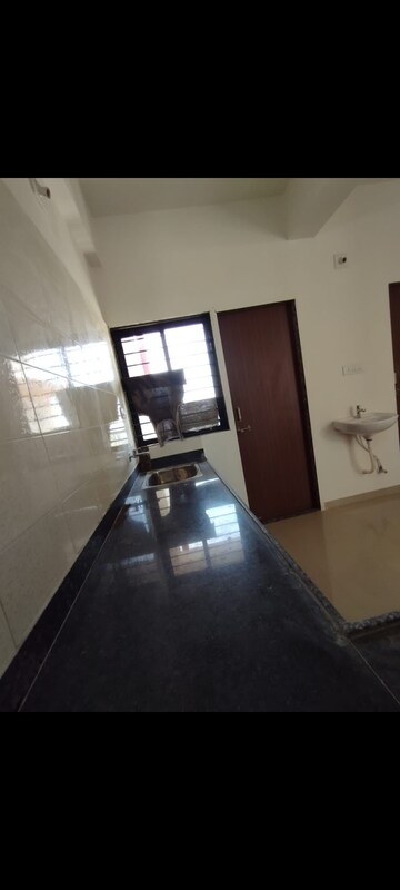Kitchen in 4 BHK Apartment at Adani Shantigram Water Lily, Shantigram – for Rent