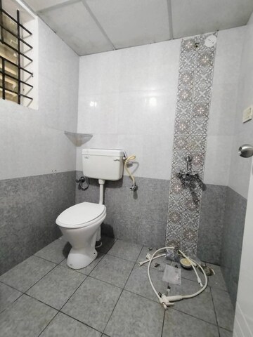 Bathroom in 2 BHK Apartment at Mangalam – for Sale
