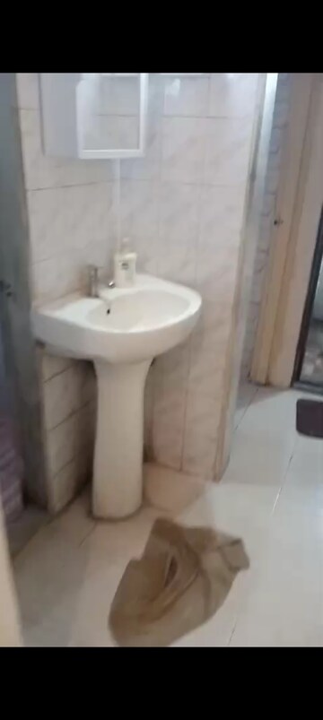 Bathroom in 1 BHK Apartment at Suyog CHS Tilak Nagar, Tilak Nagar – for Rent