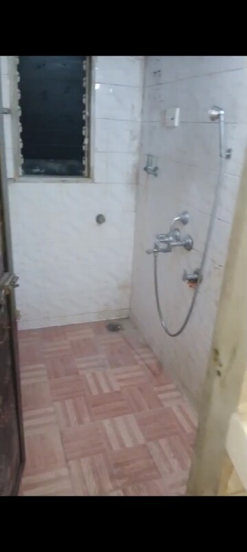 Bathroom in 1 BHK Apartment at Suyog CHS Tilak Nagar, Tilak Nagar – for Rent