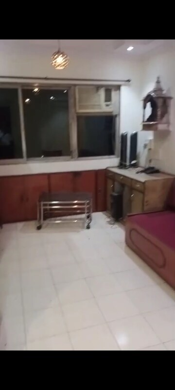 Living Room in 1 BHK Apartment at Suyog CHS Tilak Nagar, Tilak Nagar – for Rent
