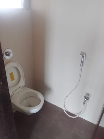Bathroom in 1 BHK Apartment at Vihang Valley Phase1, Kasarvadavali – for Rent