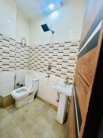 Bathroom in 3 BHK Builder Floor at Dwarka Mor – for Rent