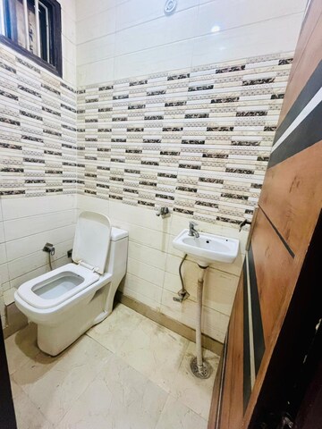 Bathroom in 3 BHK Builder Floor at Dwarka Mor – for Rent