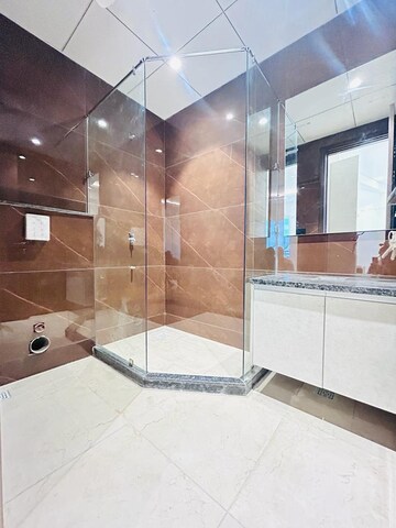Bathroom in 4 BHK Builder Floor at Ansal API Esencia, Sector 67 – for Sale