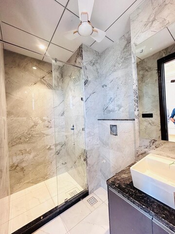 Bathroom in 4 BHK Builder Floor at Ansal API Esencia, Sector 67 – for Sale