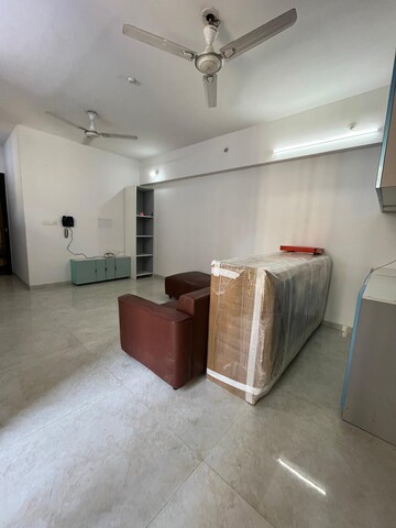Living Room in 1 BHK Apartment at Lodha Palava City Lakeshore Greens, Dombivli East – for Rent
