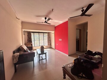 Living Room in 1 BHK Apartment at Suncity Jupiter, Powai – for Rent
