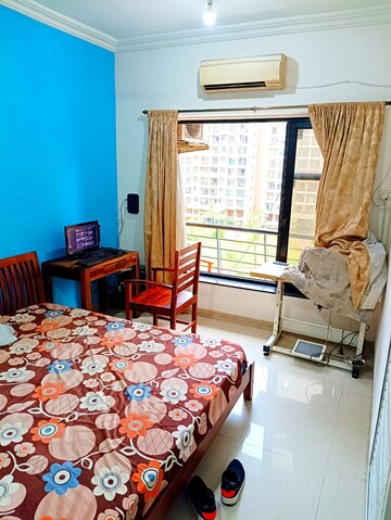 Bedroom in 2 BHK Apartment at K Raheja Heights, Malad East – for Rent