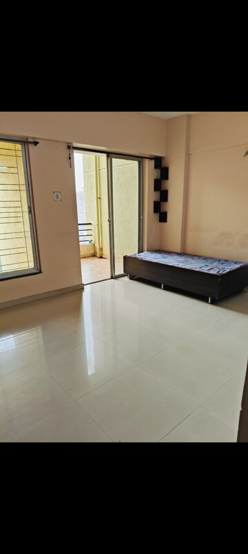 Room in 2 BHK Apartment at Karan Rhea, Wadegaon – for Sale