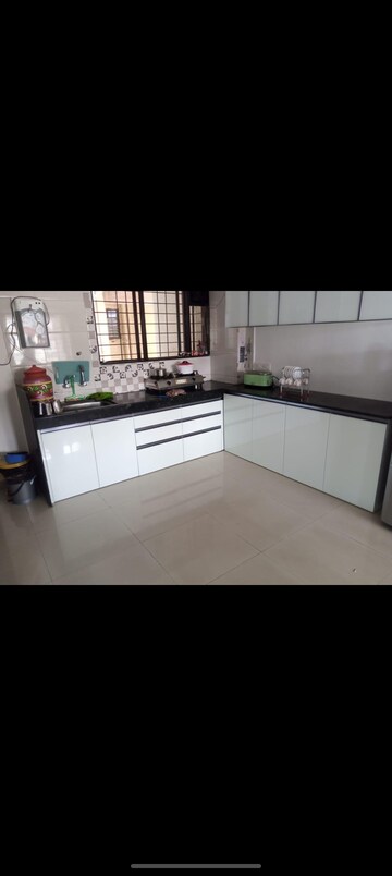 Kitchen in 2 BHK Apartment at Satyam Serenity, Wadgaon Sheri – for Sale