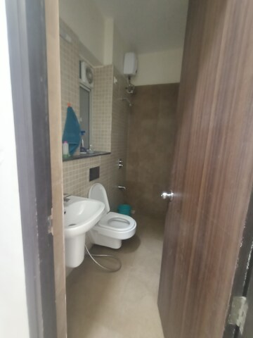 Bathroom in 3 BHK Apartment at Runwal Greens, Mulund West – for Rent