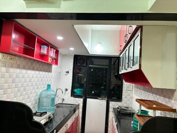 Kitchen in 2 BHK Apartment at Royal Palms Garden View, Goregaon East – for Rent