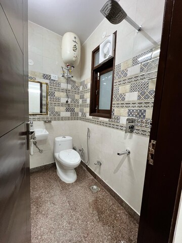 Bathroom in 3 BHK Builder Floor at New Friends Colony – for Rent