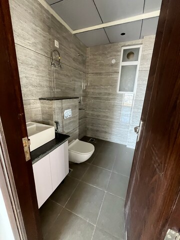 Bathroom in 3 BHK Apartment at Aura Gazania, High Ground – for Rent