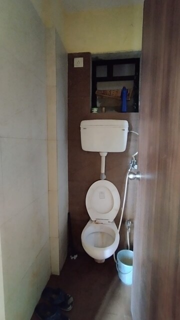Bathroom in 1 BHK Apartment at Raunak City Sector 4 D7, Kalyan West – for Sale
