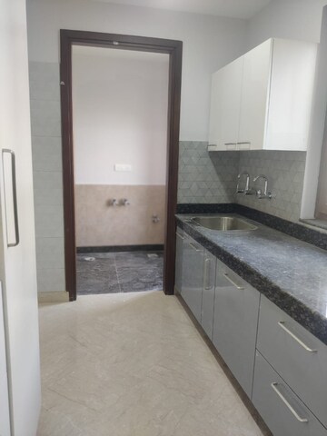 Kitchen in 3 BHK Builder Floor at Safdarjang Enclave – for Sale
