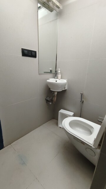 Bathroom in 2 BHK Apartment at Prime CHS, Mulund East – for Rent