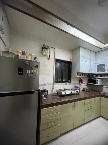 Kitchen in 2 BHK Apartment at Vile Parle West – for Rent