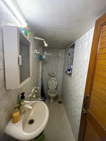 Bathroom in 2 BHK Apartment at Vile Parle West – for Rent