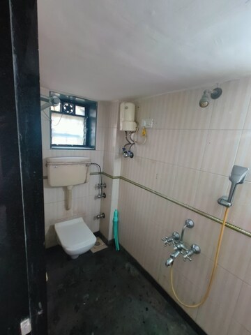Attached Bathroom in 2 BHK Apartment at Vile Parle West – for Rent