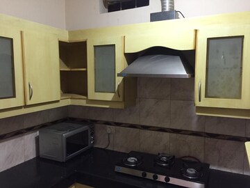 Kitchen in 3 BHK Apartment at Nirvana Courtyard, Sector 50 – for Rent