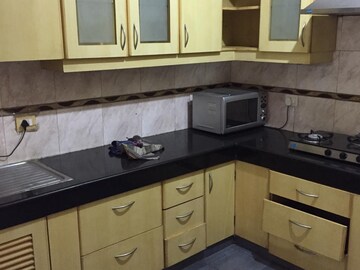 Kitchen in 3 BHK Apartment at Nirvana Courtyard, Sector 50 – for Rent