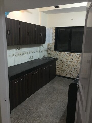 Kitchen in 3 BHK Apartment at Valentine Apartments, Goregaon East – for Rent