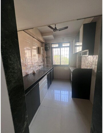 Kitchen in 2 BHK Apartment at Lodha Paradise, Majiwada – for Sale