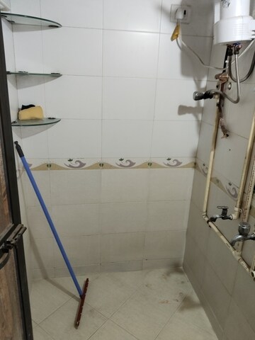 Bathroom in 1 BHK Apartment at Millennium Cooperative Housing Society, Goregaon West – for Rent