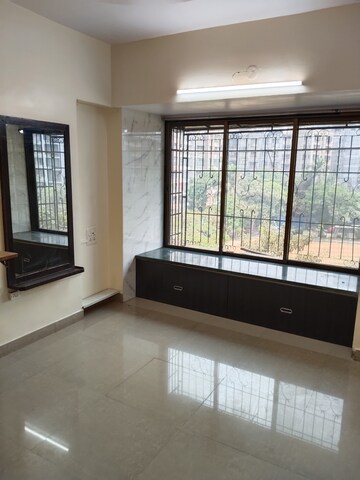 Bedroom in 1 BHK Apartment at Millennium Cooperative Housing Society, Goregaon West – for Rent