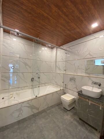 Bathroom in 3 BHK Builder Floor at Sahastradhara Road – for Sale