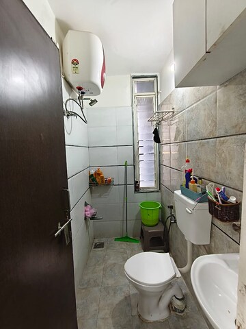 Bathroom in 2 BHK Apartment at Dharmadev Swaminarayan Park 3, Vasna – for Rent