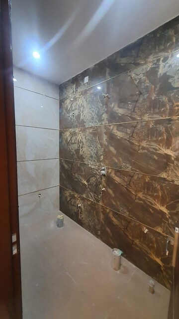 Bathroom in 2 BHK Builder Floor at Sahastradhara Road – for Sale