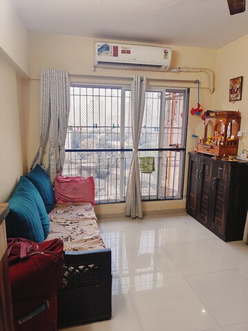 Living Room in 1 BHK Apartment at Eco Winds, Bhandup West – for Rent