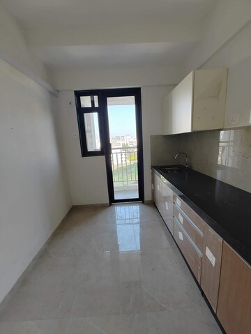 Kitchen in 1.5 BHK Apartment at MICL Aaradhya Highpark, Mira Road – for Sale
