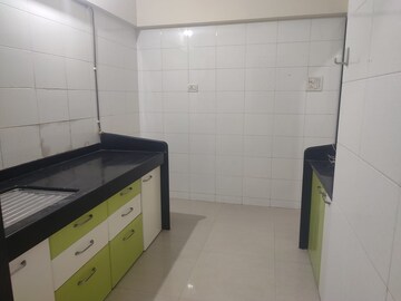 Kitchen in 2 BHK Apartment at Gaurav Apartment Goregaon, Goregaon East – for Rent