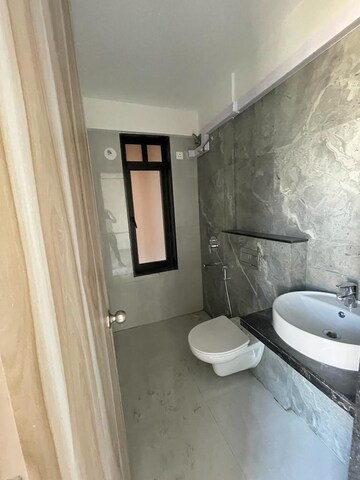 Bathroom in 1 BHK Apartment at MICL Aaradhya Highpark, Mira Road – for Sale