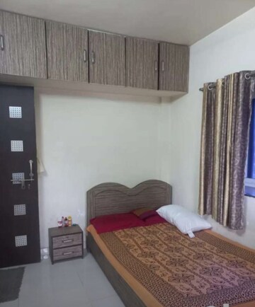Bedroom in 1 BHK Apartment at Raut Baug Housing Complex, Dhankawadi – for Rent