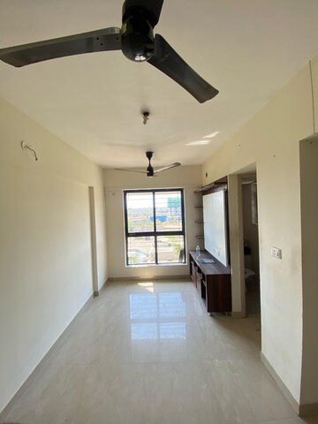 Living Room in 1 BHK Apartment at Lodha Crown Quality Homes Dombivli, Dombivli East – for Rent