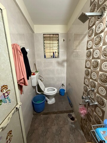 Bathroom in 1 RK Apartment at Seawoods – for Sale