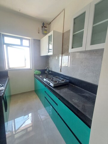 Kitchen in 1 BHK Apartment at Sheth Irene, Malad West – for Rent