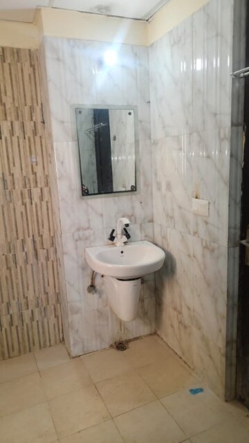 Bathroom in 2 BHK Apartment at Amrapali Princely Estate, Sector 76 – for Rent